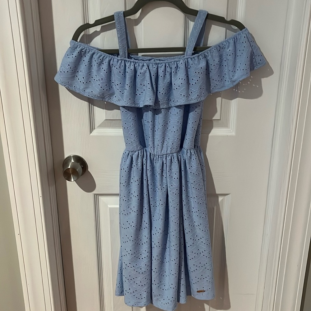 Light blue dress with little holes and straps over shoulder